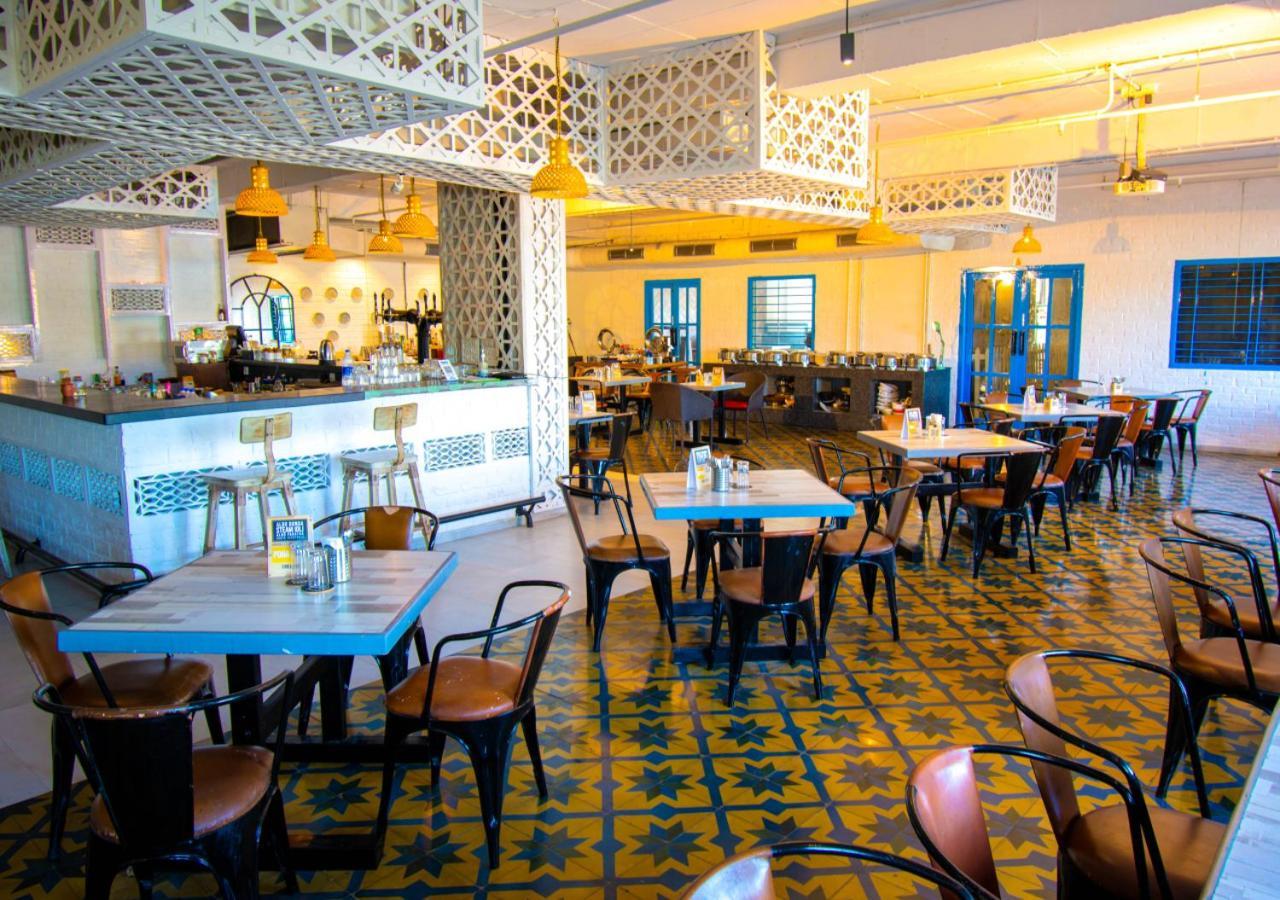 Bloom Hotel - Gachibowli Haiderabad Buitenkant foto